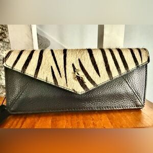 FREE FREE wallet with a purchase over $400. Real fur/ leather wallet. NWT